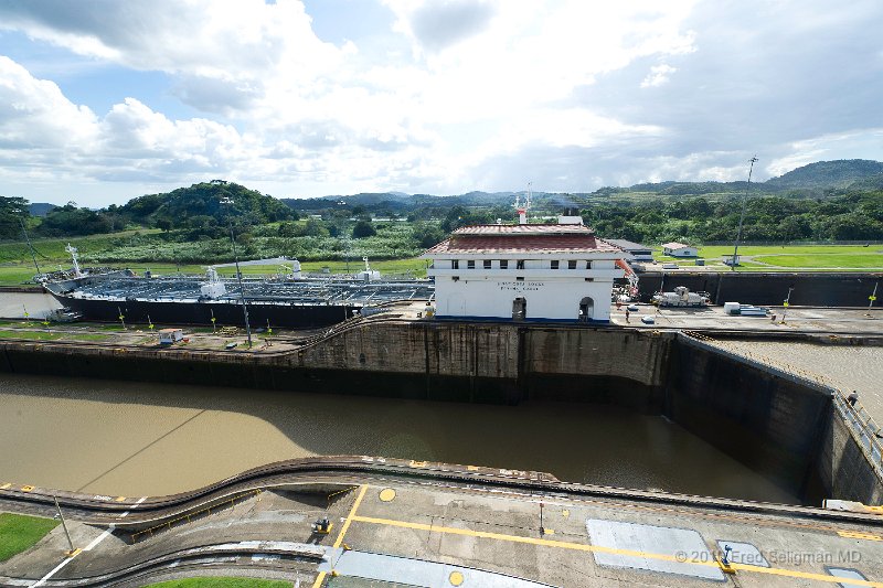 20101204_154754 D3S.jpg - Miraflores Locks, Panama Canal.  Tanker is almost completely in the 2nd chamber lock.